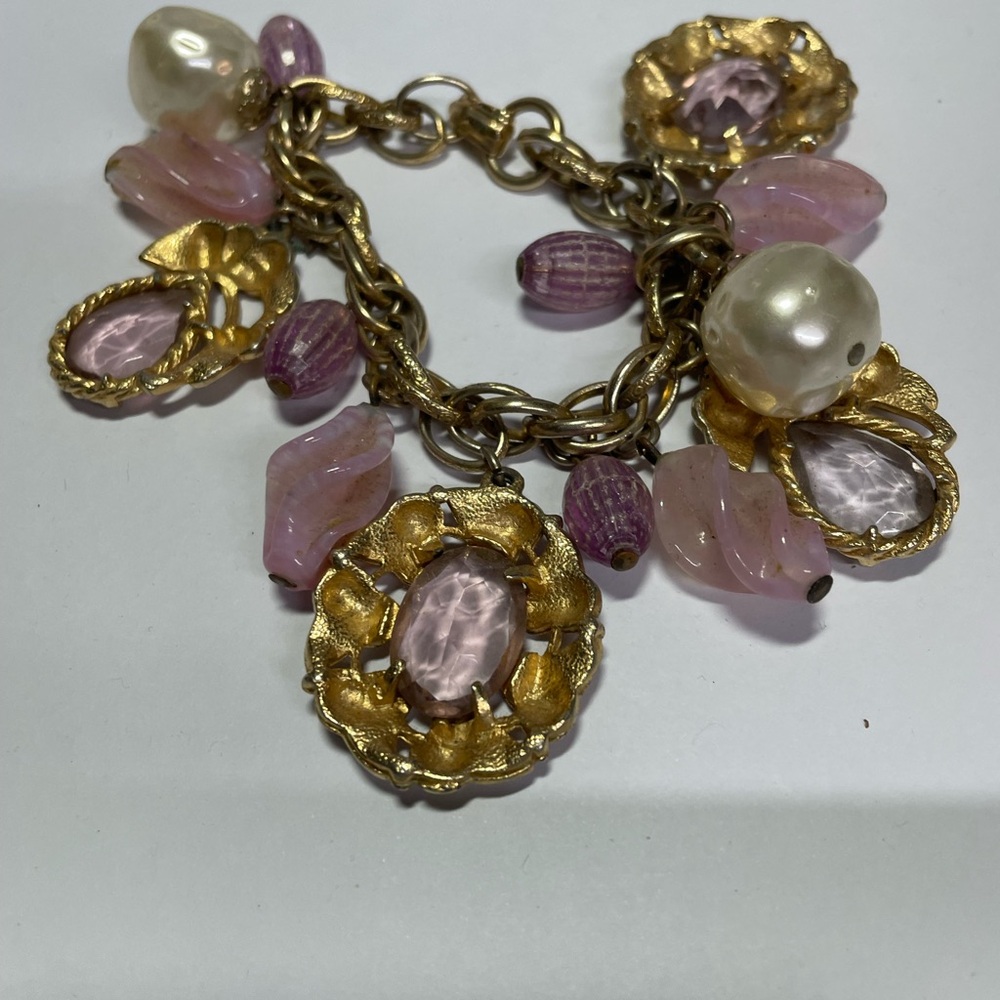 Gold and Pink Charm Bracelet with Ornate Details